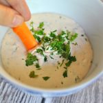 Sour cream based sauce with fresh parsley