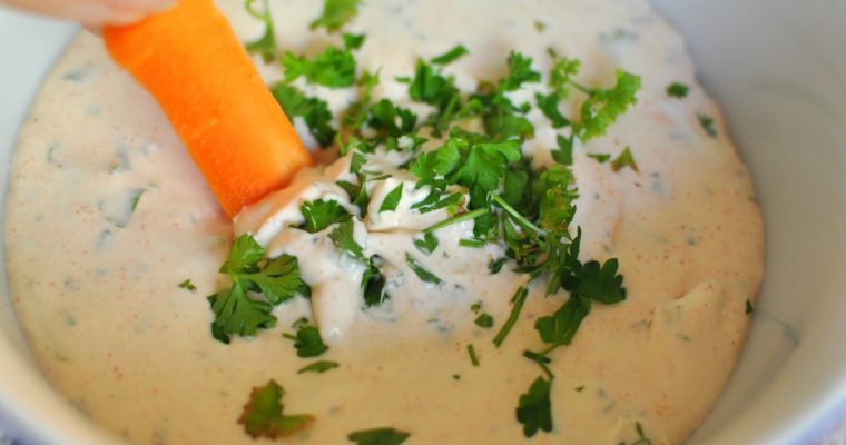 Sour cream based sauce with fresh parsley